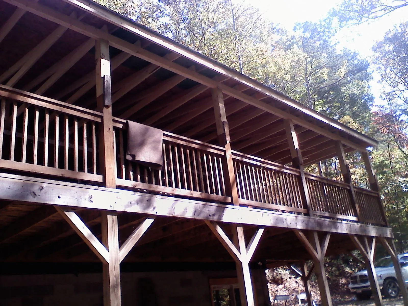 Timber framing under a new elevated porch and deck — Roof Leak Repair in Winger by Roofing Brothers